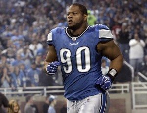Detroit Lions defensive tackle Ndamukong Suh enters the field for the start of their NFL football game in Detroit