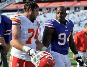 Kansas City Chiefs tackle Winston chats with Buffalo Bills defensive end Williams at end of their NFL football game in Orchard Park