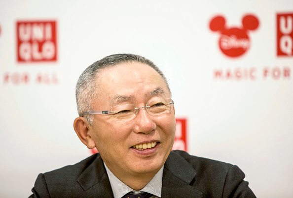 Tadashi Yanai, chairman, president and chief executive officer of Fast Retailing Co., smiles during an interview in Shanghai, China, on Saturday, Sept. 26, 2015. Yanai said Walt Disney Co.s new park in Shanghai will help his Uniqlo casual wear brand expand in China, shrugging off concerns over an economic slowdown in the Japanese retailers largest overseas market. Photographer: Qilai Shen/Bloomberg via Getty Images