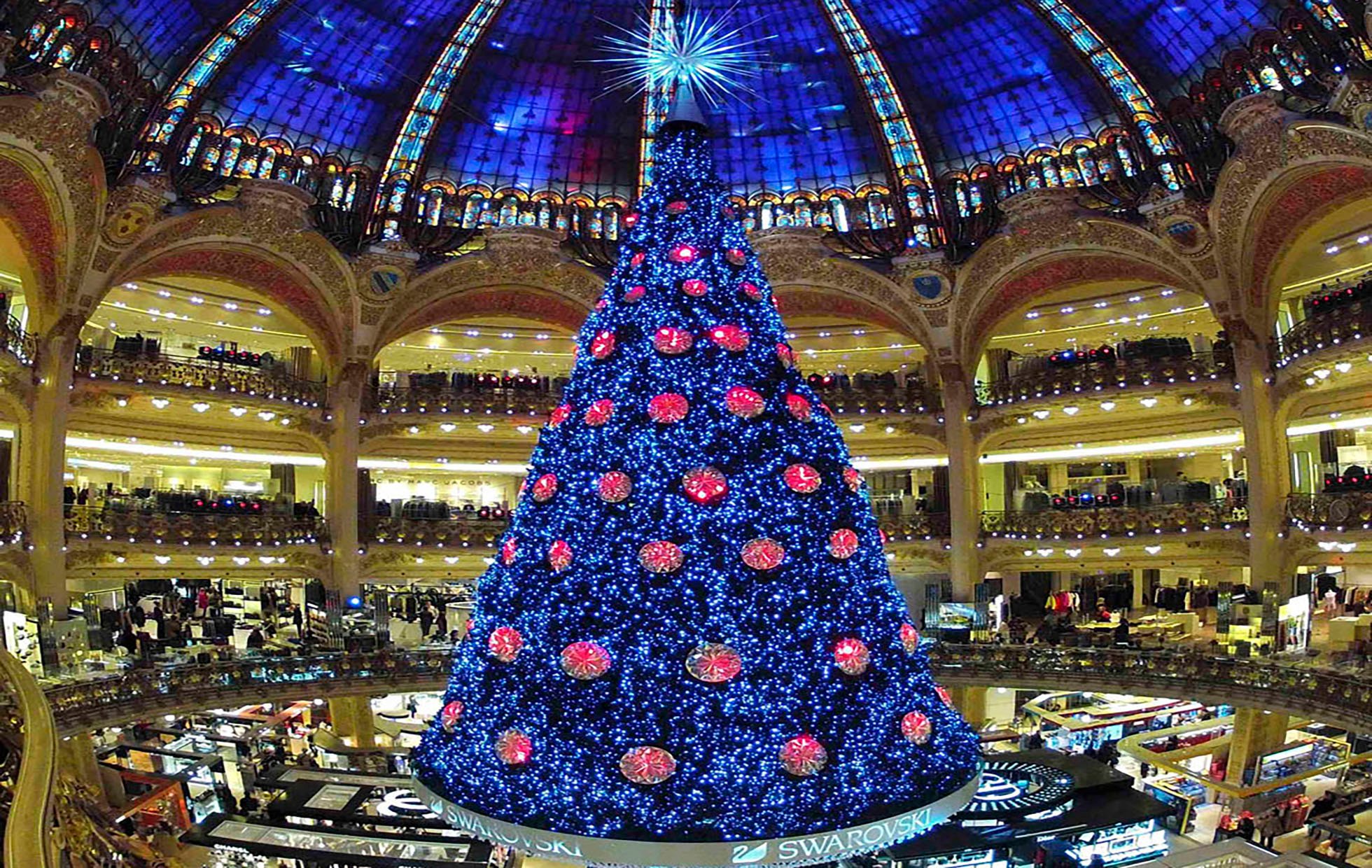 A giant Christmas tree stands in the middle of the Galeries Lafayette department store in Paris ahead of the holiday season in the French capital, December 13, 2012. REUTERS/Charles Platiau (FRANCE - Tags: SOCIETY)